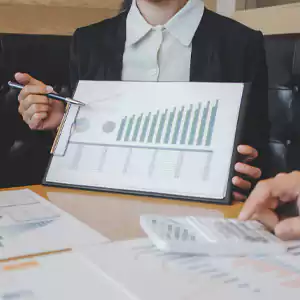 a person using a pen on a design tablet